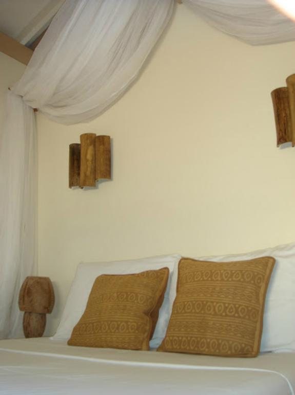 Calibishie Lodges Hotel Chambre photo