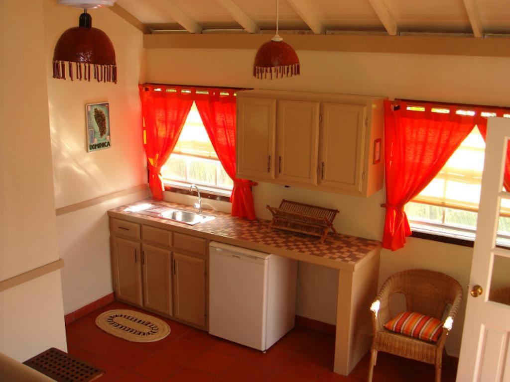 Calibishie Lodges Hotel Chambre photo